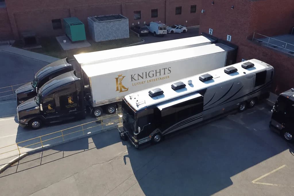 Tour trucking alongside a Knights Coaches entertainer coach
