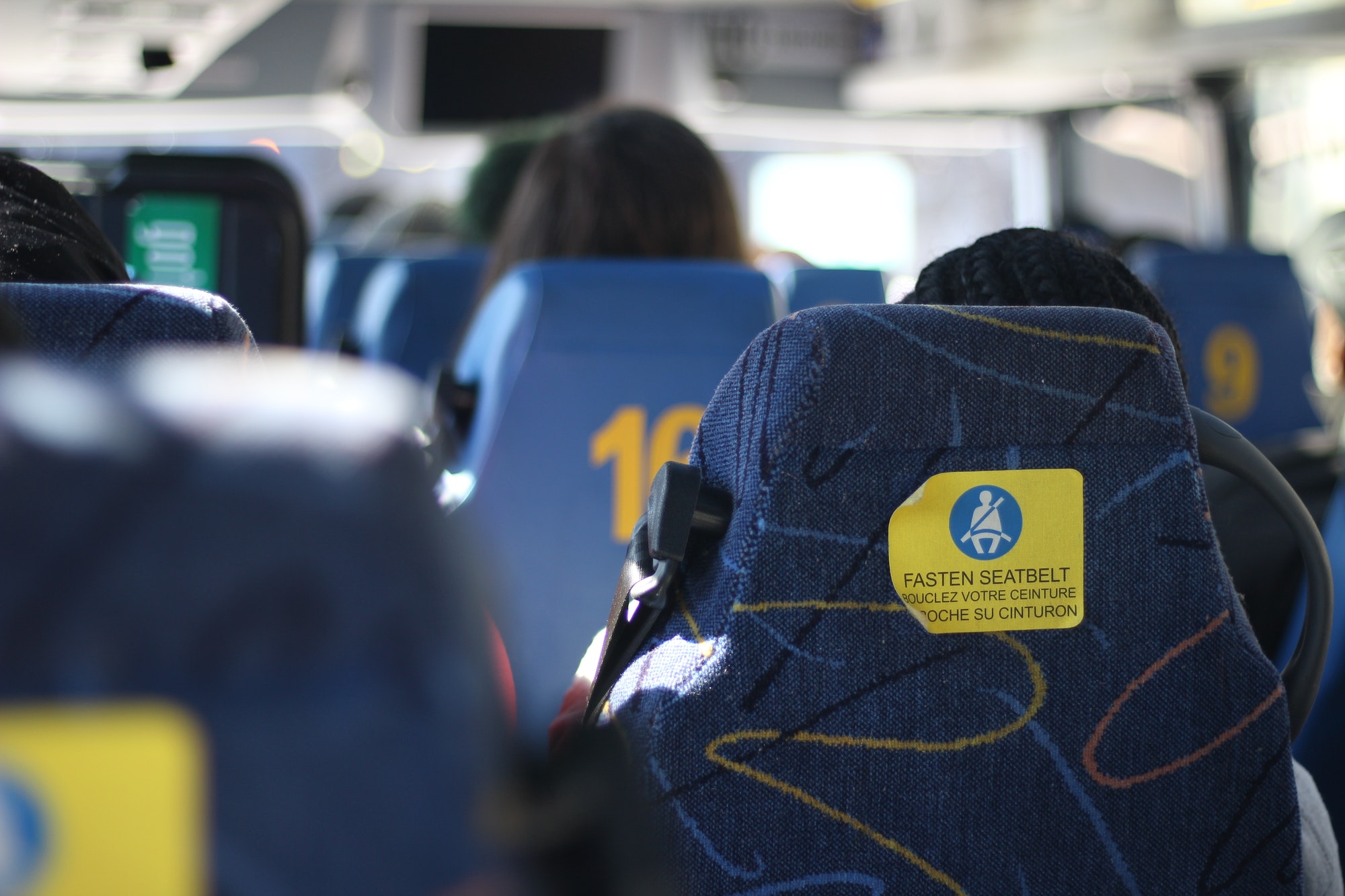 A chartered bus loading a group before departure